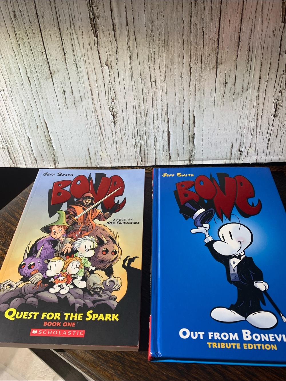Two Bone books one hardcover story book and 1 Graphic novel Jeff Smith